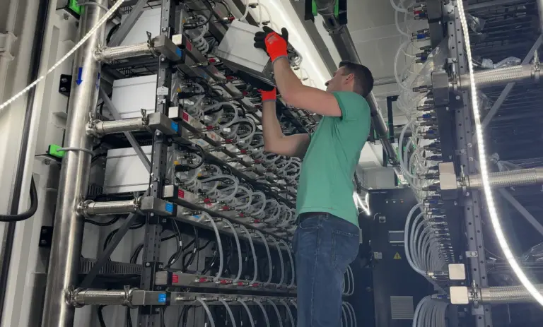 Hamus team working on bitcoin miner hosting in their facilities in Norway.