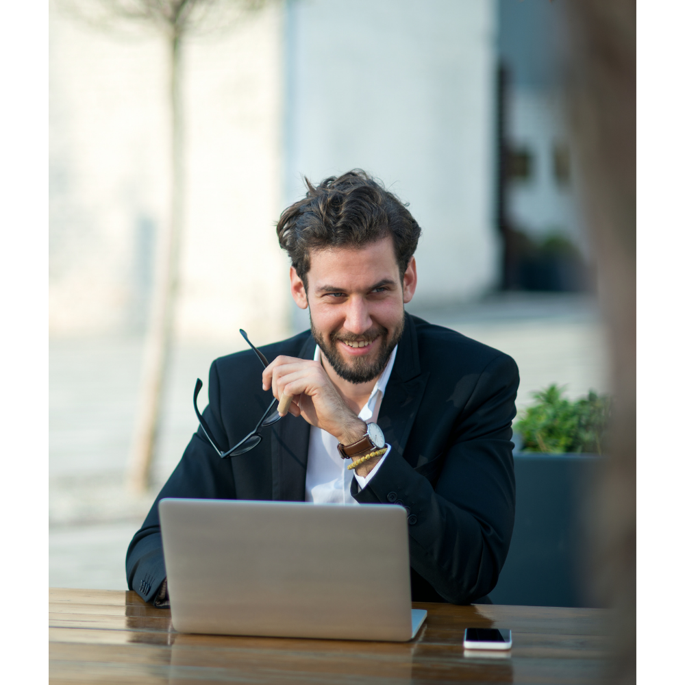 Cryptocurrency investor analyzing Bitcoin mining performance on a laptop, representing crypto hosting clients, mining profitability analysis, and digital asset management. Looking at what is Bitcoin wallet exactly?