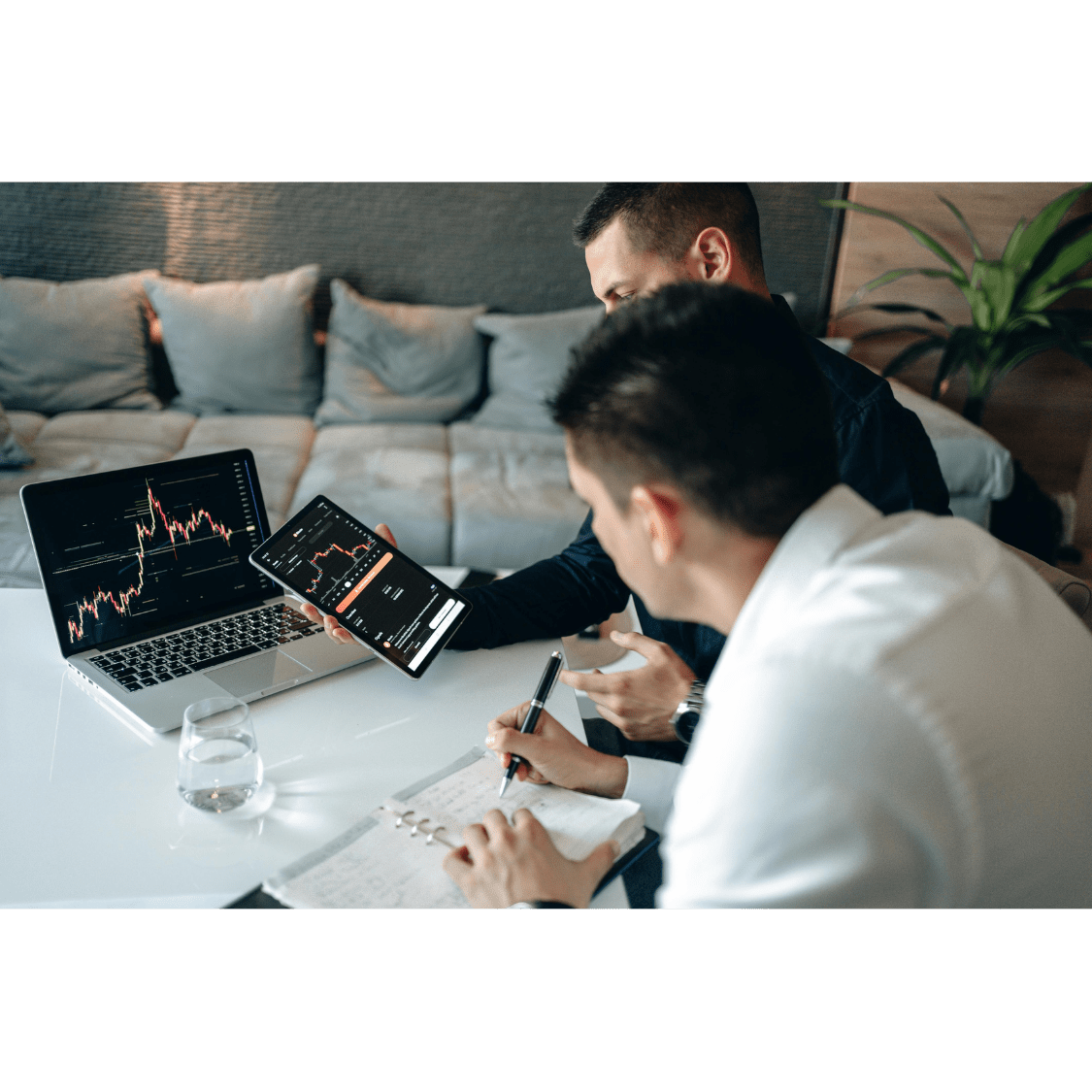 two men working on trading zcash strategy at a work settings